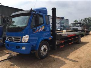 Xe tải Thaco Olin950A nâng đầu chở máy công trình